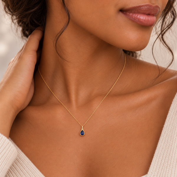 9k yellow gold sapphire pendant & chain