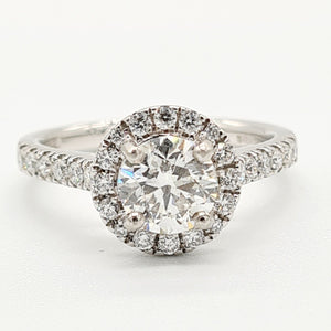 18ct White Gold Brilliant Cut Diamond Halo Ring (0.64ct + 0.15ct)